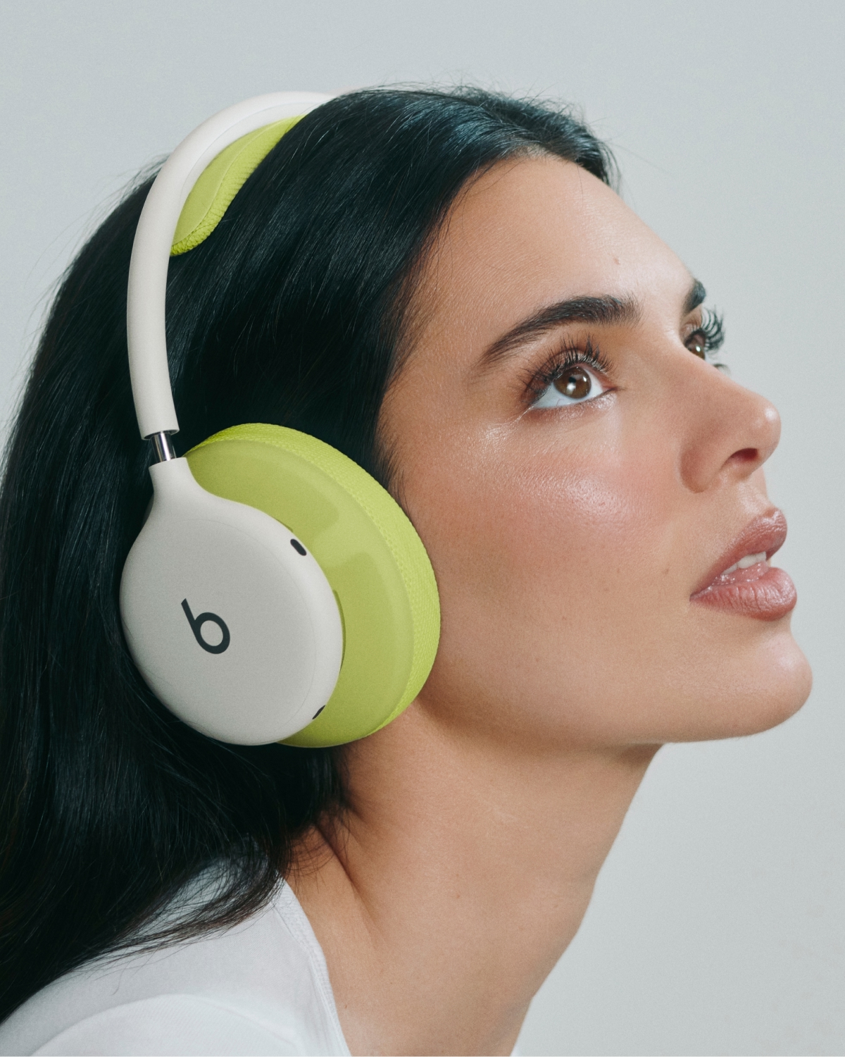 Kendall Jenner wearing Beats 360 headphones in Cloud frame with Performance Knit Cushion Kit in Volt