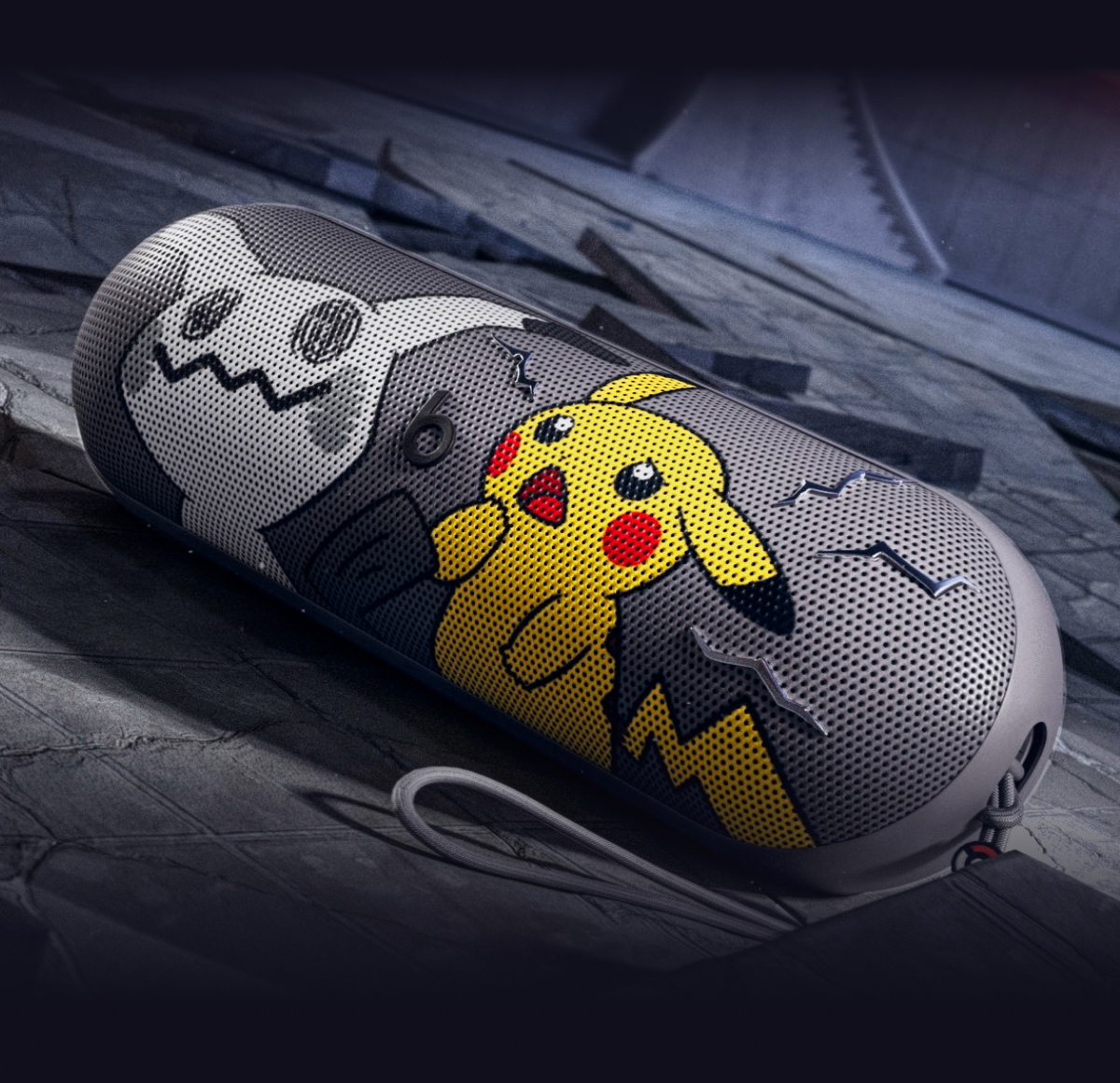 The special-edition Pokémon Beats Pill portable Bluetooth® speaker featuring Pikachu and Mimikyu characters on the front grill.