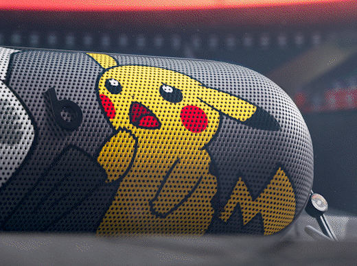 The special-edition Pokémon Beats Pill portable Bluetooth® speaker featuring Pikachu and Mimikyu characters on the front grill.