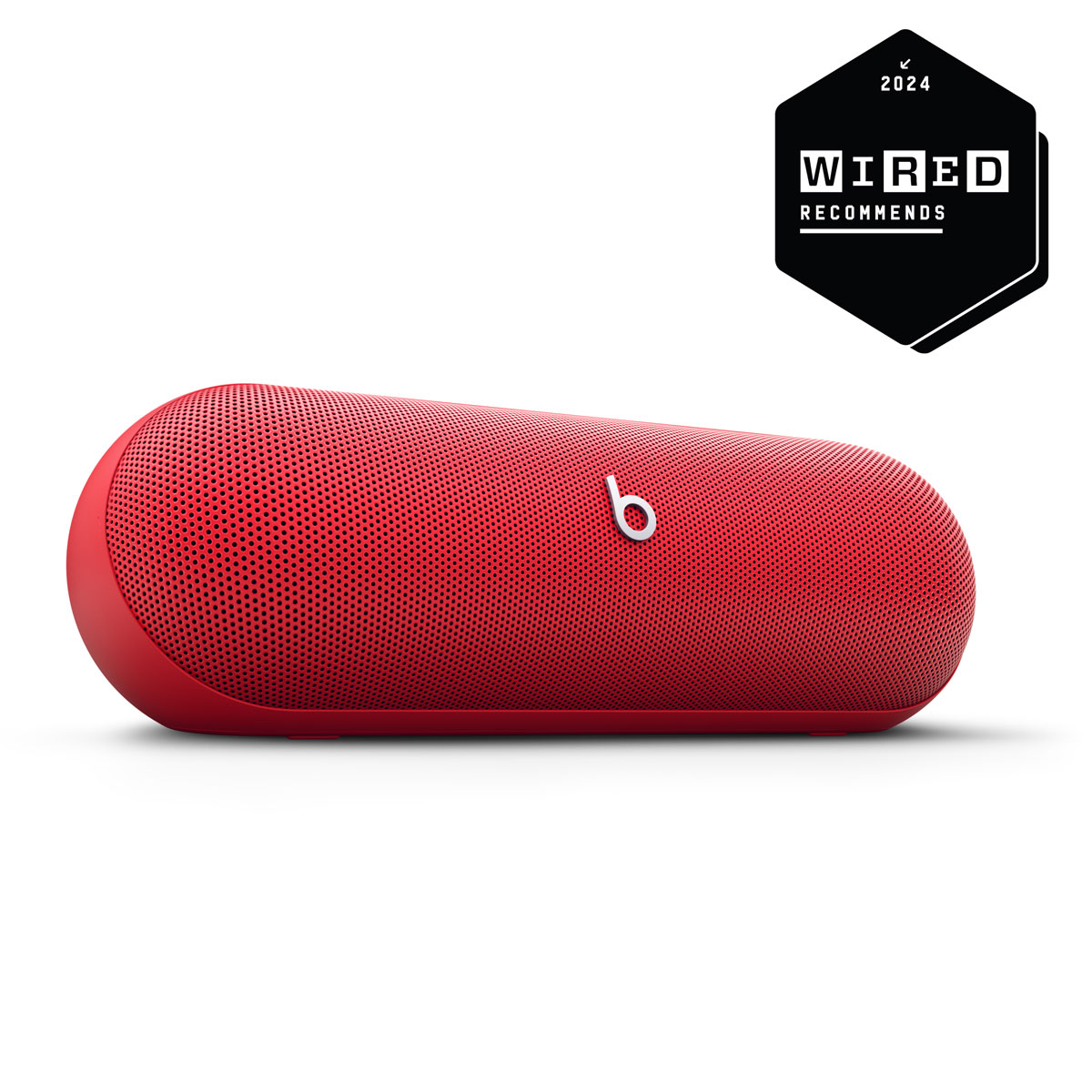 Vue rapprochée d’une enceinte Beats Pill en rouge relevé